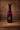Leather saddle water bottle holder with fuchsia suede top