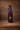 Leather saddle water bottle holder with red suede top