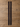 Close-up of two rows of white stitching on harness leather rear billet