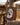 Hair on hide padfolio front and tooled back cover leaned against a fence post at a sale barn