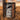 Hair on hide cowhide portfolio #4 leaning on a fence post in a pasture at sunset