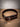 Dark oil leather dog collar showing the stainless D-ring for the leash, buckle, and Tyler Shupe maker's mark
