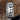 Jeremiah Watt stainless steel belt keeper with engraved floral scrollwork over black patina for 1.5 inch belts, on cowhide
