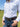 Pink Heritage Buckstitch Belt with silver western buckle worn with white western shirt and jeans outdoors in a pasture