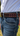 Side view of Pink Heritage Buckstitch Belt worn with jeans, showing Tyler Shupe stamp and double row of pink buckstitching