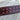 Tyler Shupe maker's stamp on Pink Heritage Buckstitch Belt showing hand-threaded pink buckstitching in premium dark brown leather