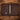 Inside of the dark brown oil-tanned leather portfolio with 3 ring binder, angled sleeve, three card slots, and clear ID window